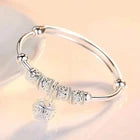 Elegant Silver-Tone Bangle Bracelet with Floral Engraved Design & Round Dangle Charm – Stylish Fashion Jewelry for Women
